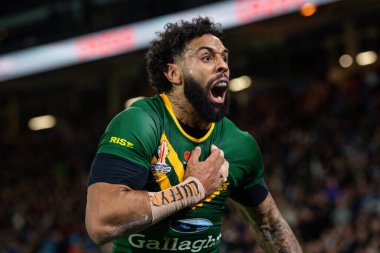 Avustralyalı Josh Addo-Carr, 11 Kasım 202 'de Avustralya ile Yeni Zelanda arasındaki Rugby Ligi Dünya Kupası 2021 yarı final maçında denemesini kutluyor.