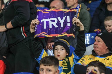 Avustralyalı Valentine Holmes, Avustralya ile Yeni Zelanda arasındaki Rugby Ligi 2021 Dünya Kupası 'nda 11 Kasım 202' de oynanan Elland Road, Leeds, İngiltere karşılaşmasında bir deneme kartı tutuyor.