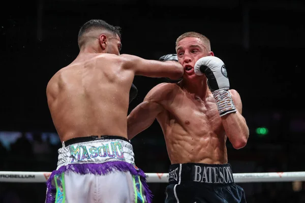 stock image Fighters trade blows  in the Jack Bateson vs Shabaz Masoud fight at the Sunny Edwards vs Felix Alvarado card at Utilita Arena, Sheffield, United Kingdom, 11th November 202