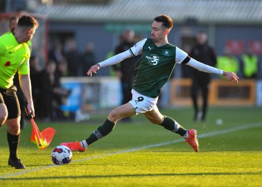 Plymouth Argyle forvet Ryan Hardie (9) 12 Kasım 202 tarihinde Gelder Group Sincil Bank Stadyumu 'nda Lincoln City - Plymouth Argyle maçında hücum etti.