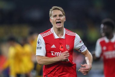 Martin degaard # 8 Arsenal Premier League maçında Wolverhampton Wanderers, Molineux, Wolverhampton, Birleşik Krallık 'ta 12 Kasım 2022' de Arsenal 'e karşı 0-1' lik galibiyetini kutluyor.