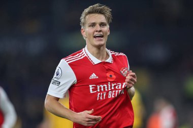 Martin degaard # 8 Arsenal Premier League maçında Wolverhampton Wanderers, Molineux, Wolverhampton, Birleşik Krallık 'ta 12 Kasım 2022' de Arsenal 'e karşı 0-1' lik galibiyetini kutluyor.