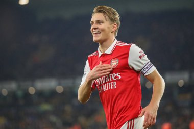 Martin degaard # 8 Arsenal Premier League maçında Wolverhampton Wanderers, Molineux, Wolverhampton, Birleşik Krallık 'ta 12 Kasım 2022' de Arsenal 'e karşı 0-1' lik galibiyetini kutluyor.