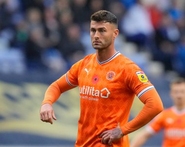 Wigan Athletic, Wigan Stadyumu 'nda Blackpool' a karşı 12 Kasım 202 'de oynanan Gökyüzü İddia Şampiyonası maçında Blackpool golcüsü Gary Madine