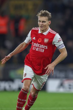 Martin degaard # 8 Arsenal Premier League maçında Wolverhampton Wanderers, Molineux, Wolverhampton, Birleşik Krallık 'ta 12 Kasım 2022' de Arsenal 'e karşı 0-2' lik galibiyet golünü kutluyor.