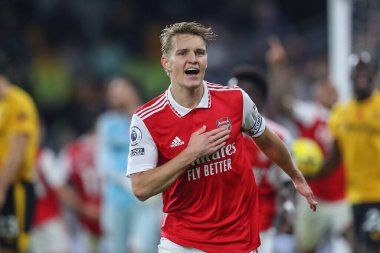 Martin degaard # 8 Arsenal Premier League maçında Wolverhampton Wanderers, Molineux, Wolverhampton, Birleşik Krallık 'ta 12 Kasım 2022' de Arsenal 'e karşı 0-1' lik galibiyetini kutluyor.