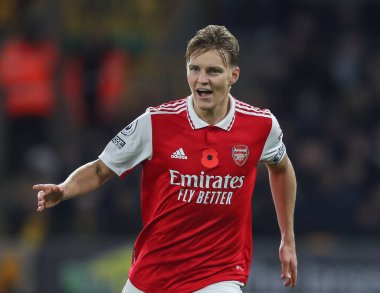 Martin degaard # 8 Arsenal Premier League maçında Wolverhampton Wanderers, Molineux, Wolverhampton, Birleşik Krallık 'ta 12 Kasım 2022' de Arsenal 'e karşı 0-2' lik galibiyet golünü kutluyor.