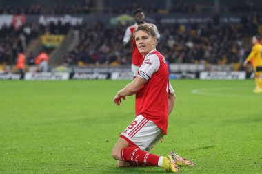 Martin degaard # 8 Arsenal Premier League maçında Wolverhampton Wanderers, Molineux, Wolverhampton, Birleşik Krallık 'ta 12 Kasım 2022' de Arsenal 'e karşı 0-2' lik galibiyet golünü kutluyor.