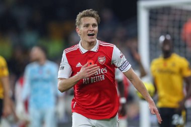 Martin degaard # 8 Arsenal Premier League maçında Wolverhampton Wanderers, Molineux, Wolverhampton, Birleşik Krallık 'ta 12 Kasım 2022' de Arsenal 'e karşı 0-1' lik galibiyetini kutluyor.