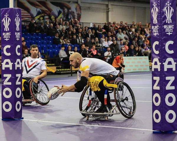 stock image Jeremy Bourson of France goes over for a try during the Wheelchair Rugby League World Cup 2021 Semi Final match France vs Australia at English Institute of Sport Sheffield, Sheffield, United Kingdom, 13th November 202