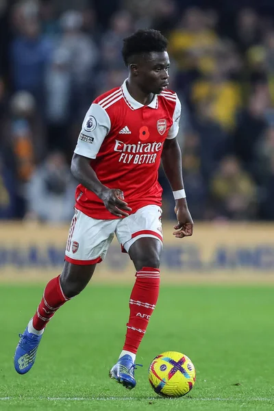 stock image Bukayo Saka #7 of Arsenal during the Premier League match Wolverhampton Wanderers vs Arsenal at Molineux, Wolverhampton, United Kingdom, 12th November 202