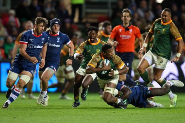 Sikhumbuzo Notshe of South Africa A is tackled  by Gabriel Ibitoye of Bristol Bears during the Friendly match Bristol Bears vs South Africa Select XV at Ashton Gate, Bristol, United Kingdom, 17th November 2022 clipart