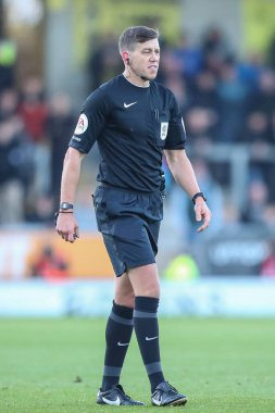 Hakem Martin Woods, Sky Bet Ligi 1 karşılaşmasında Burton Albion ile Plymouth Argyle arasında oynanan Pirelli Stadyumu 'nda 19 Kasım 2022 tarihinde Trent, İngiltere' de oynanan karşılaşmada yer aldı.