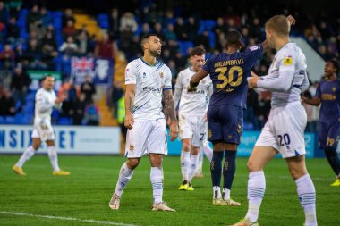 Tranmere Rovers 'ın 10 numaralı oyuncusu Kane Hemmings, 19 Kasım 2022' de İngiltere 'nin Birkenhead kenhead kentinde oynanan Sky Bet 2 maçında Tranmere Rovers' ın AFC Wimbledon 'a karşı oynadığı maçta penaltıyı kaçırmasına tepki gösterdi.