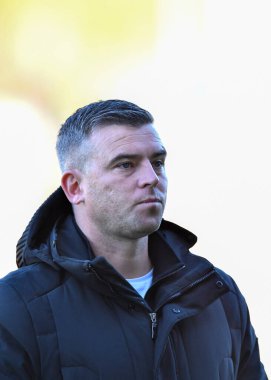 Plymouth Argyle teknik direktörü Steven Schumacher, 19 Kasım 2022 'de İngiltere' nin Trent kentindeki Pirelli Stadyumu 'nda oynanan Sky Bet 1 karşılaşmasında Burton Albion ve Plymouth Argyle karşı karşıya gelirken üzgün görünüyor.