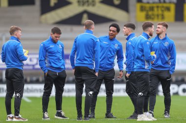 Chippenham Town oyuncuları, 27 Kasım 2022 tarihinde Birleşik Krallık 'ın Trent kentindeki Pirelli Stadyumu' nda oynanan Burton Albion - Chippenham Town maçının ikinci turu öncesinde geldiler.