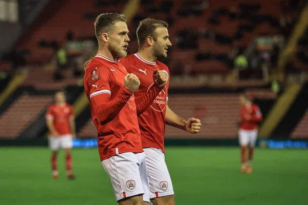 stock image Josh Benson #10 of Barnsley celebrates his penalty goal to make it 3-0 during the Emirates FA Cup  Round 2 match Barnsley vs Crewe Alexandra at Oakwell, Barnsley, United Kingdom, 26th November 2022