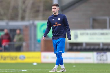 Jordan Young # 9, Chippenham Town 'dan maç öncesi ısınma turu öncesinde Emirates FA Cup 2' de Burton Albion 'a karşı Chippenham Town Pirelli Stadyumu' nda, Burton Trent üzerine, 27 Kasım 2022