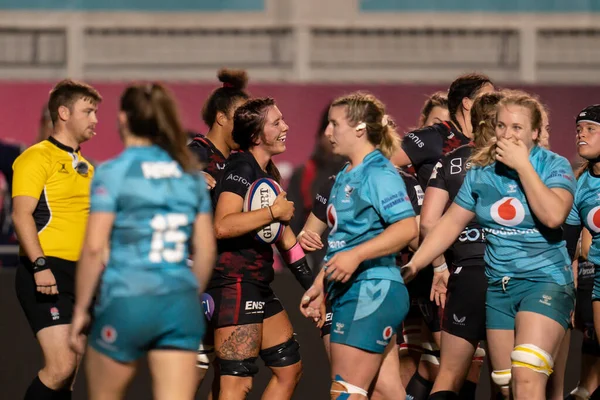 stock image  Georgia Evans #8 of Saracens Women celebrates scoring a try with team mates during the Women's Allianz Premier 15's match Saracens Women vs Wasps Women at StoneX Stadium, London, United Kingdom, 27th November 2022