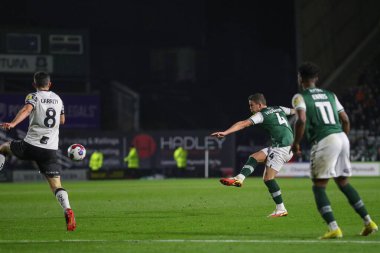 Plymouth Argyle 'dan Jordan Houghton 2 Aralık 202' de İngiltere 'nin Plymouth kentinde oynanan Sky Bet 1 karşılaşmasında gol atma şansı yakaladı.