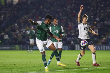 Plymouth Argyle 'dan Niall Ennis # 11, 2 Aralık 202' de İngiltere 'nin Plymouth kentinde oynanan Sky Bet Lig 1 karşılaşmasında gol atma şansı yakaladı.