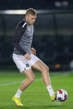 Plymouth Argyle 'dan Sam Cosgrove 2 Aralık 202' de İngiltere 'nin Plymouth kentinde Plymouth Argyle' a karşı Plymouth Ligi 1 maçı öncesinde ısınma turunda