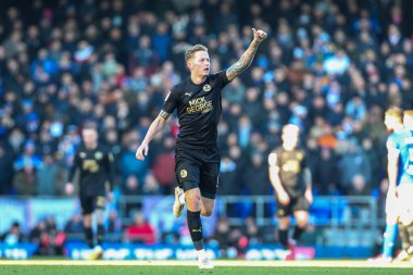 Peterborough United takımından Frankie Kent, 10 Aralık 2022 'de Ipswich Town' a karşı Peterborough, Ipswich Road, İngiltere 'de oynanan 1-1' lik Gökyüzü İddia Ligi karşılaşmasında golünü kutluyor.