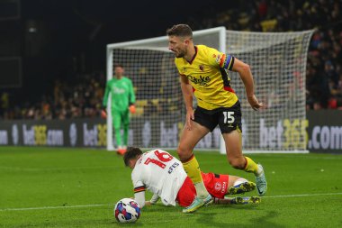 Watford 'dan 15 numaralı Craig Cathcart 11 Aralık 2022' de Watarage Road, Watford, İngiltere 'de oynanan Sky Bet Şampiyonası' nda Hull City 'den Ryan Longman' ı alt etti.