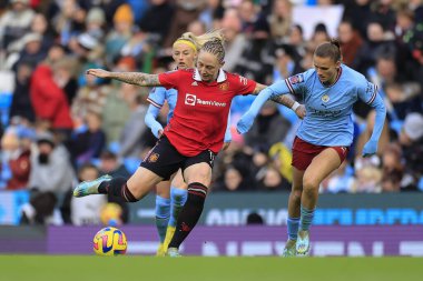 Manchester United 'dan Leah Galton # 11 ve Manchester City' den Kerstin Casparij # 2 FA Kadınlar Süper Ligi karşılaşmasında Manchester City United Women - Etihad Campus, Manchester, İngiltere