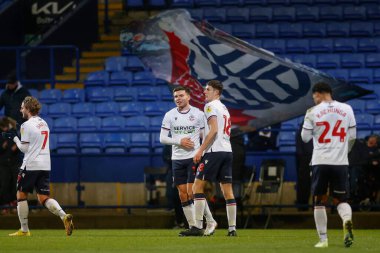 Bolton Wanderers 'dan Aaron Morley 13 Aralık 2022' de Bolton Stadyumu, Bolton Üniversitesi 'nde oynanan Papa John' s Trophy maçında 2-0 kazanma hedefini kutluyor.