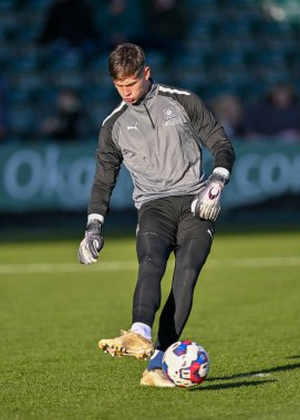 Plymouth Argyle kalecisi Michael Cooper (1), 17 Aralık 2022 'de İngiltere' nin Plymouth kentinde oynanan Sky Bet 1 karşılaşmasında ısınma turunda Plymouth Argyle ile Morecambe karşı karşıya geldi.