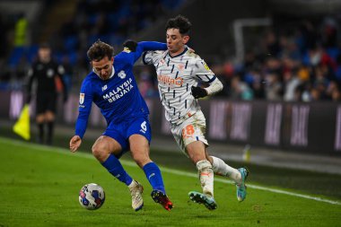 Cardiff City - Blackpool Stadyumu, Cardiff, İngiltere 'de 17 Aralık 2022' de oynanan Cardiff City - Blackpool maçında Cardiff City # 6 numaralı Cardiff City maçında Blackpool topu için mücadele etti.