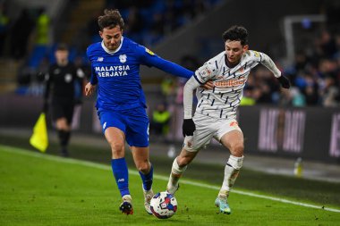 Cardiff City - Blackpool Stadyumu, Cardiff, İngiltere 'de 17 Aralık 2022' de oynanan Cardiff City - Blackpool maçında Cardiff City # 6 numaralı Cardiff City maçında Blackpool topu için mücadele etti.