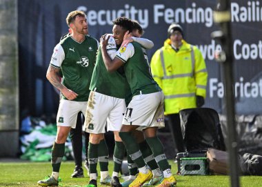 GoAL Plymouth Argyle forveti Niall Ennis (11), 17 Aralık 2022 'de Home Park, Plymouth, Birleşik Krallık' ta oynanan Sky Bet League 1 karşılaşmasında 1-0 berabere kalma golünü kutluyor.