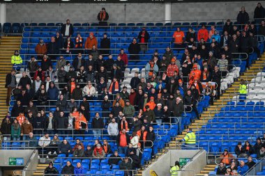 Blackpool taraftarları, 17 Aralık 2022 'de Cardiff City Stadyumu' nda oynanan ve Blackpool 'a karşı oynanan Sky Bet Şampiyonası maçı sırasında
