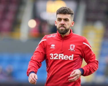 Middlesbrough 'dan Tommy Smith 17 Aralık 2022' de Burnley ile Middlesbrough arasındaki Gökyüzü İddia Şampiyonası maçından önce ısınıyor.