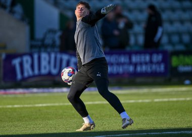 Plymouth Argyle kalecisi Michael Cooper (1), 17 Aralık 2022 'de İngiltere' nin Plymouth kentinde oynanan Sky Bet 1 karşılaşmasında ısınma turunda Plymouth Argyle ile Morecambe karşı karşıya geldi.