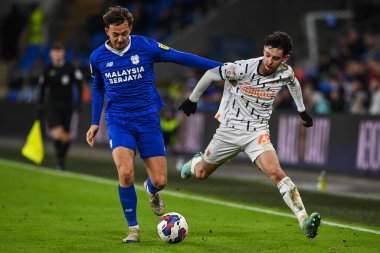 Cardiff City - Blackpool Stadyumu, Cardiff, İngiltere 'de 17 Aralık 2022' de oynanan Cardiff City - Blackpool maçında Cardiff City # 6 numaralı Cardiff City maçında Blackpool topu için mücadele etti.