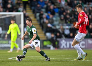 Plymouth Argyle orta saha oyuncusu Adam Randell (20), Sky Bet League 1 karşılaşmasında Plymouth Argyle ile Morecambe arasında 17 Aralık 2022 'de Home Park, Plymouth, İngiltere' de karşılaştı.