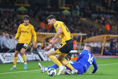 Gillingham 'ın 16 numaralı Dominic Jefferies Carabao Kupası dördüncü tur karşılaşmasında Wolverhampton Wanderers Gillingham' a karşı Molineux, Wolverhampton, Birleşik Krallık, 20 Aralık 202 'de oynanan karşılaşmada Wolverhampton Wanderers' ın 23 numaralı oyuncusu Max Kilman faul yaptı.
