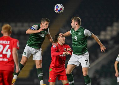 Plymouth Argyle orta saha oyuncusu Jordan Houghton (4), Papa John 's Trophy karşılaşmasında Plymouth Argyle' a karşı Home Park, Plymouth, Birleşik Krallık, 21 Aralık 202 'de AFC Wimbledon' da mücadele etti.