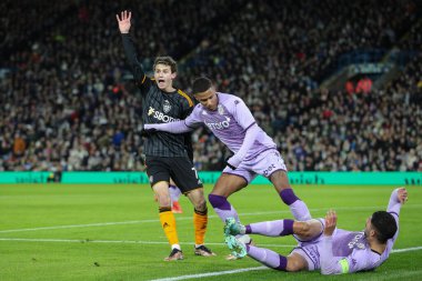 Leeds United 'ın 7 numaralı Brenden Aaronson, Leeds Road, İngiltere' de 21 Aralık 202 'de oynanan Mid sezon dostluk maçı sırasında yetkililere karşı Leeds United - Monaco maçını protesto etti.