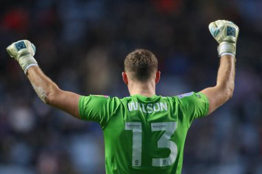 Coventry City 'den 13. Ben Wilson, Coventry Building Society Arena, Coventry, İngiltere' de 21 Aralık 202 'de Coventry City ile West Bromwich Albion arasındaki Sky Bet Şampiyonası maçında takımının kazanmasını kutluyor.