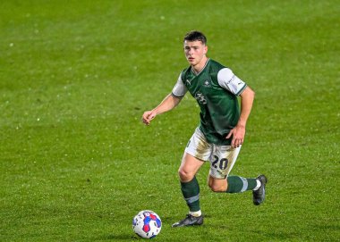 Plymouth Argyle orta saha oyuncusu Adam Randell (20) Papa John 's Trophy maçı sırasında Plymouth Argyle, Home Park, Plymouth, İngiltere' de AFC Wimbledon 'a karşı, 21 Aralık 202