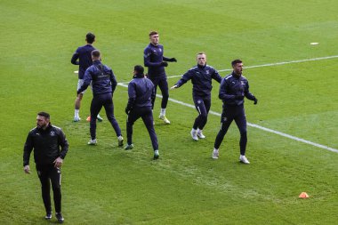 Blackpool oyuncuları, 26 Aralık 202 'de İngiltere' nin Hull şehrindeki MKM Stadyumu 'nda oynanan Hull City-Blackpool maçında ısınmaya başladılar.