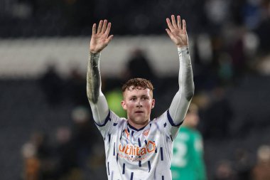 Blackpool 'dan golcü Sonny Carey 26 Aralık 202' de İngiltere 'nin Hull Stadyumu' nda oynanan Sky Bet Şampiyonası maçında taraftarları selamlıyor.