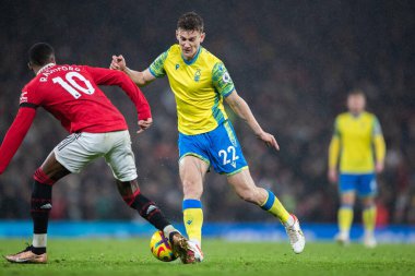 Nottingham Ormanı 'ndan Ryan Yates # 22 Premier League maçında Manchester United ile Nottingham Ormanı arasındaki 27 Aralık 202' de Manchester United 'ın Marcus Rashford # 10' u yendi.