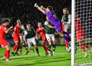 Wycombe Wanderers kalecisi Maksymilian Stryjek (1), Sky Bet 1 karşılaşmasında Wycombe Wanderers 'a karşı Home Park, Plymouth, Birleşik Krallık, 29 Aralık 202' de bir kurtarış yaptı.