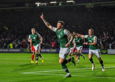 GoAL Plymouth Argyle defans oyuncusu Dan Scarr (6), 29 Aralık 202 tarihinde Home Park, Plymouth, İngiltere 'de oynanan Sky Bet League 1 karşılaşmasında 1-0' lık skorla Plymouth Argyle-Wycombe Wanderers karşılaşmasını kutluyor.