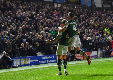 GoAL Plymouth Argyle defans oyuncusu Dan Scarr (6), 29 Aralık 202 tarihinde Home Park, Plymouth, İngiltere 'de oynanan Sky Bet League 1 karşılaşmasında 1-0' lık skorla Plymouth Argyle-Wycombe Wanderers karşılaşmasını kutluyor.